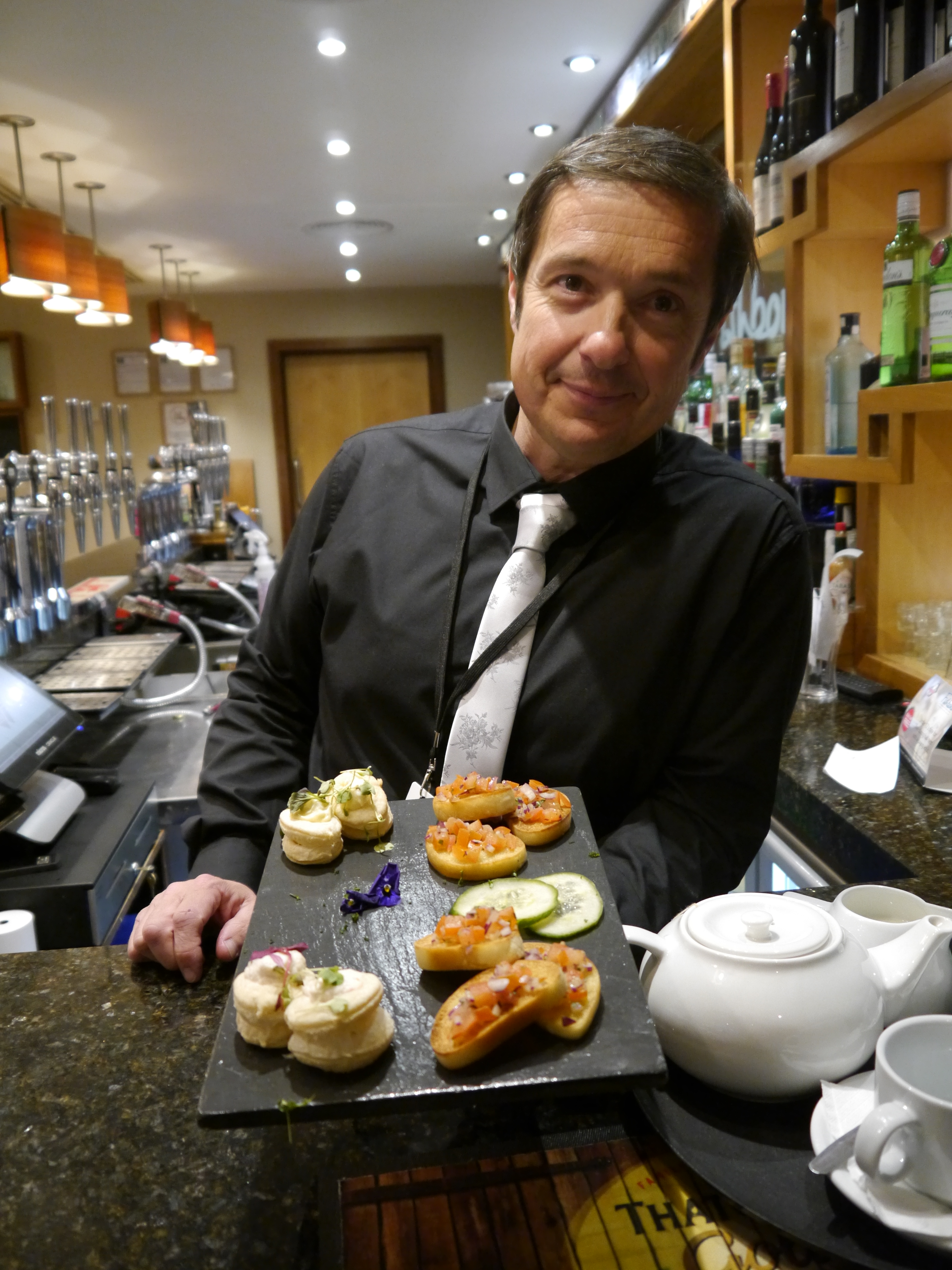 Food and Beverage Restaurant Manager Fabrice Cotte poses in Fishbone Bar & Restaurant